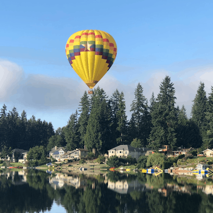 hot air balloon over lake washington
