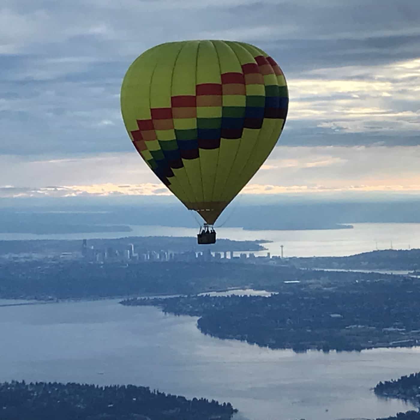 Seattle Hot Air Sunset balloon ride with city skyline in the background